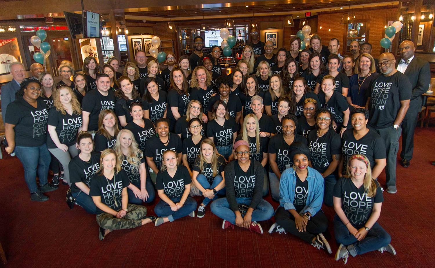 big brothers big sisters team members celebrate 10