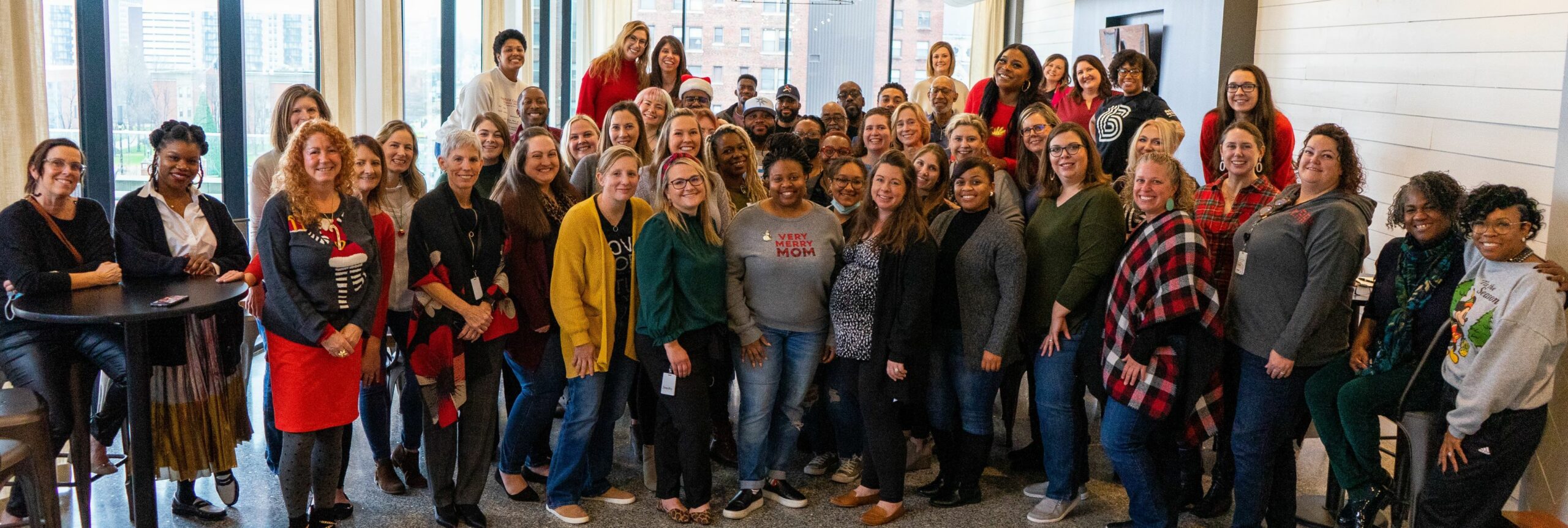 Big Brothers Big Sisters team members celebrate 10+ years together.