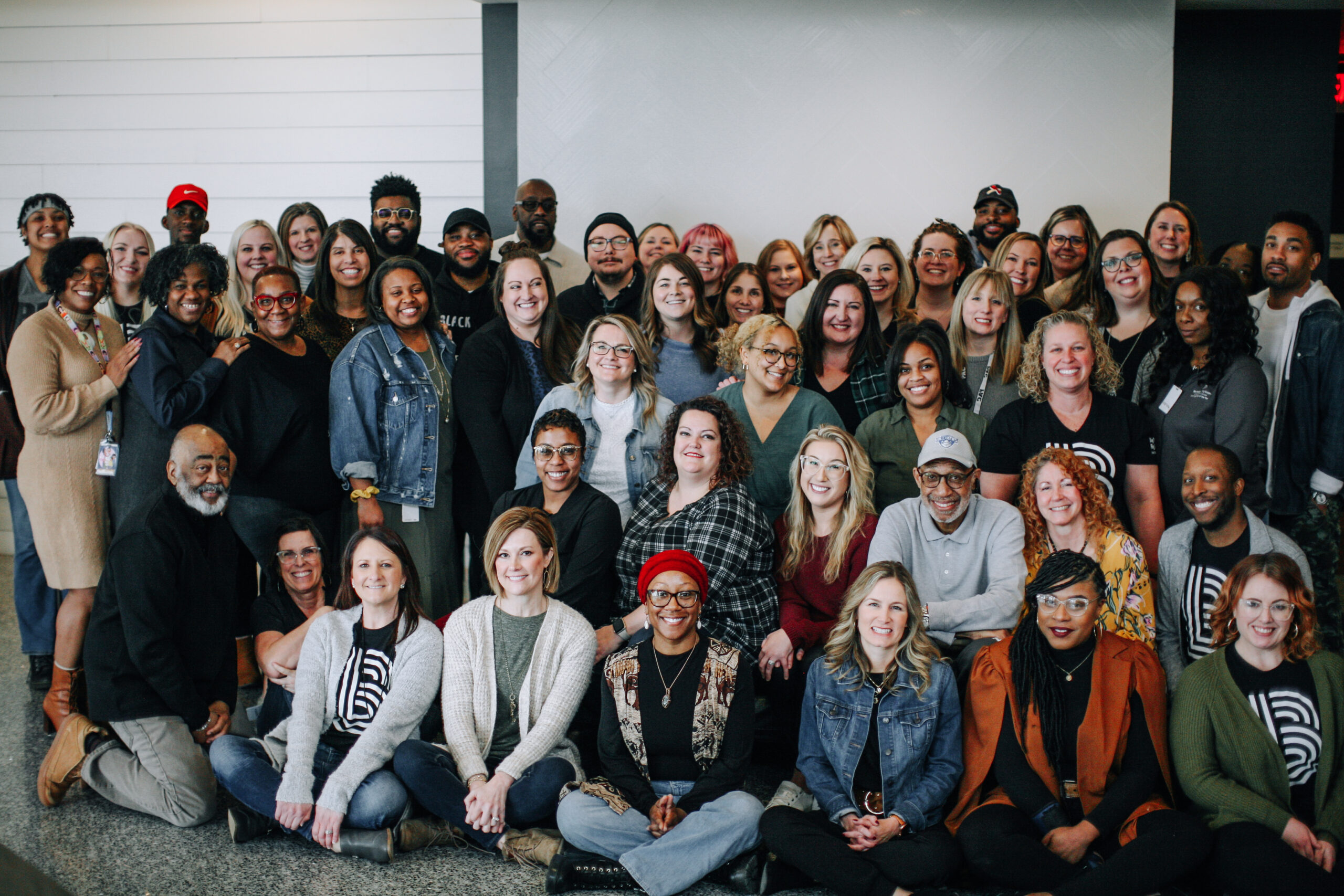 Big Brothers Big Sisters team members celebrate 10+ years together.