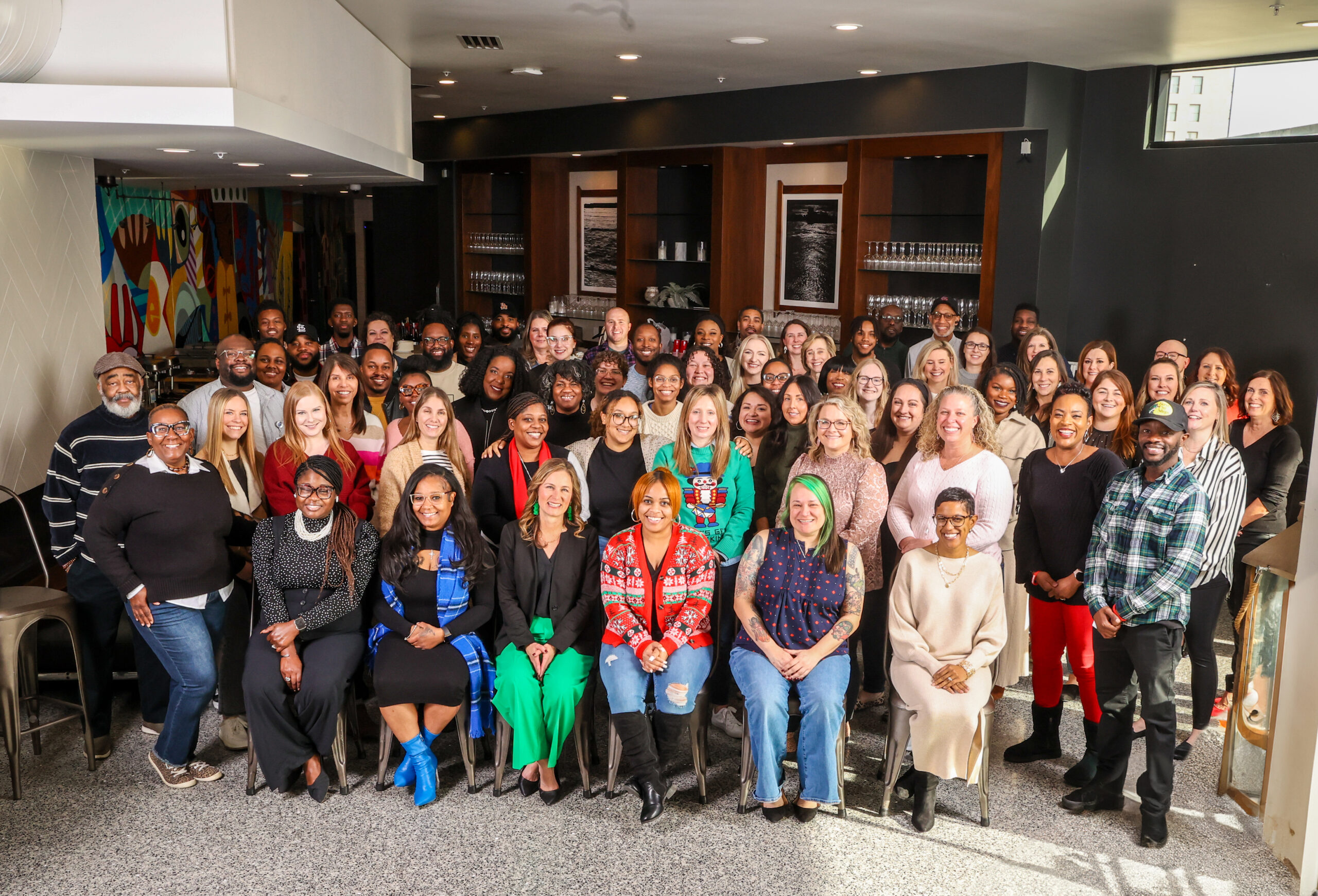 Big Brothers Big Sisters team members celebrate 10+ years together. 