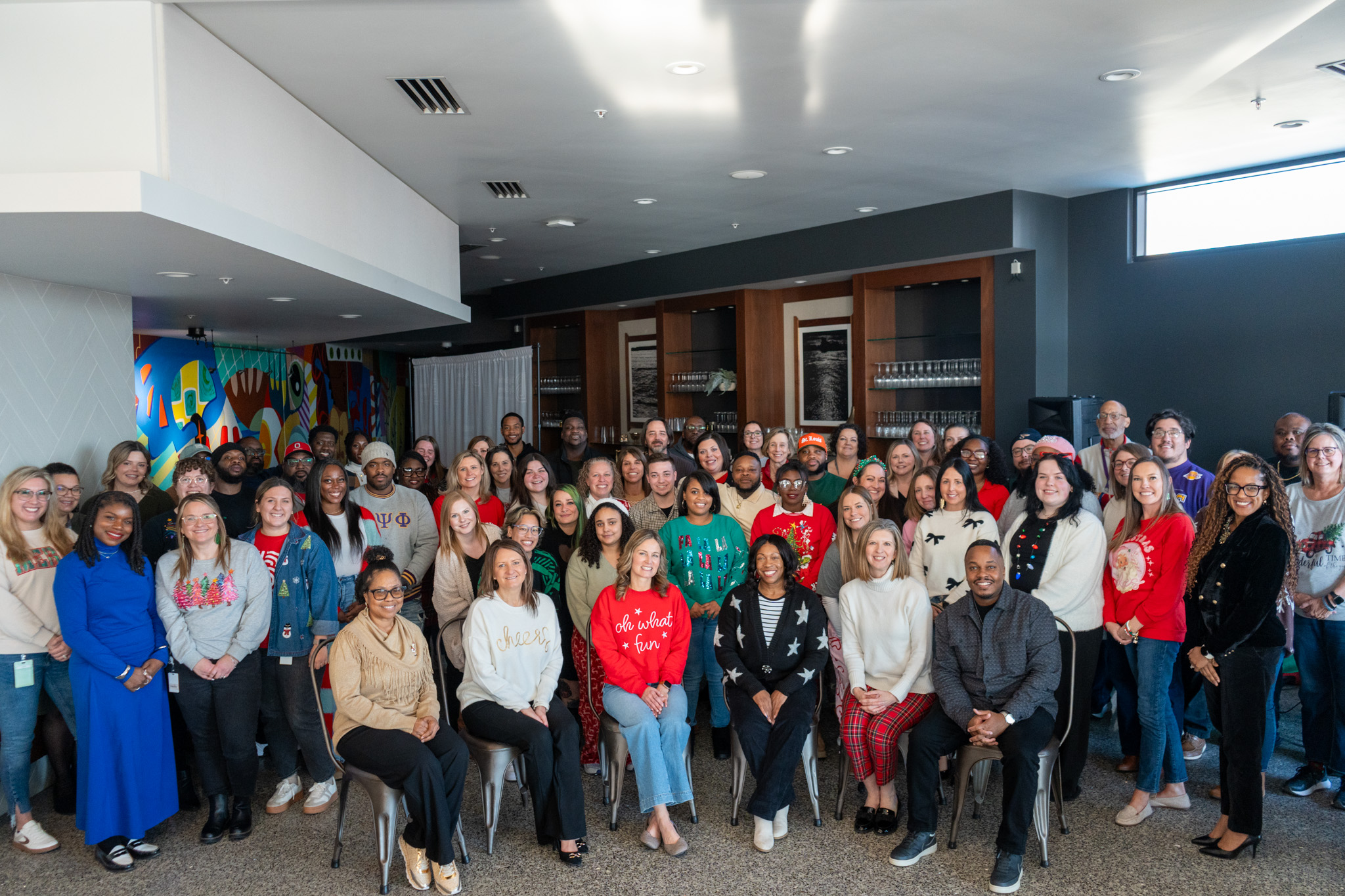 Big Brothers Big Sisters team members celebrate 10+ years together.